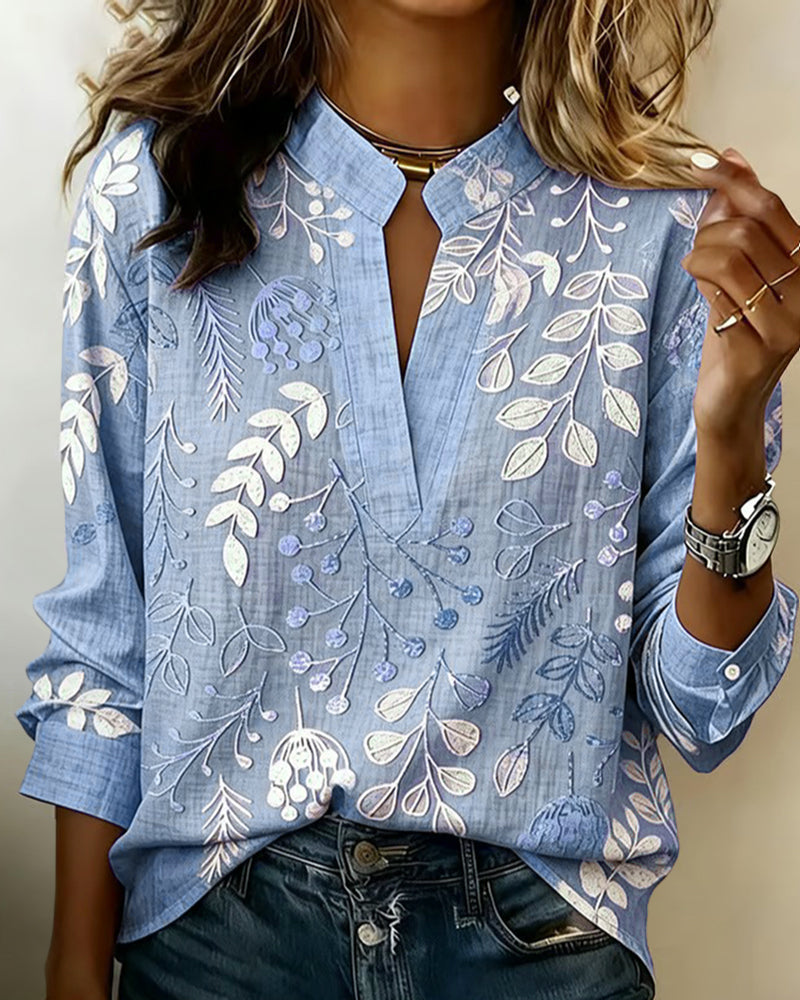 Blusa feminina floral com decote em V, tecido leve e estampa pastel