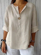 Blusa feminina decote V com botão decorativo corte amplo tecido leve