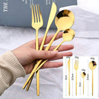 Conjunto de talheres em aço inox 24 peças com acabamento dourado e cabos coloridos preto, branco e rosa