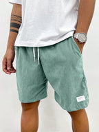Shorts casual homem com cordão ajustável corte largo verão