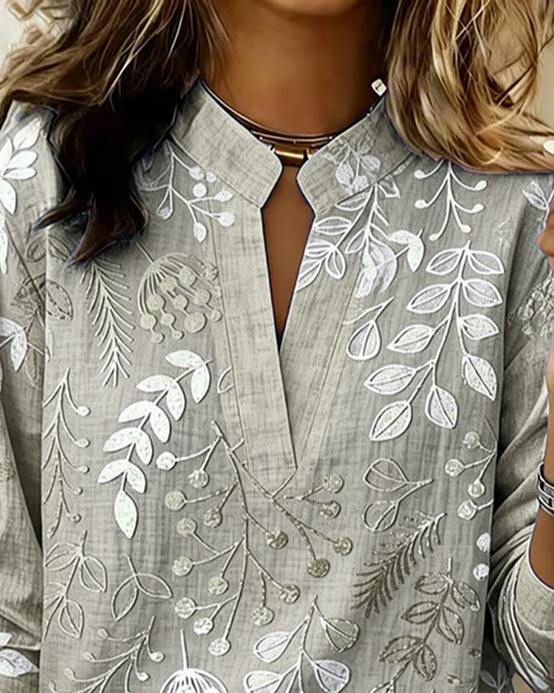 Blusa feminina floral com decote em V, tecido leve e estampa pastel