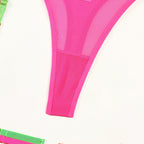 Conjunto de lingerie neon colorido com sutiã e calcinha amarelo laranja e rosa choque