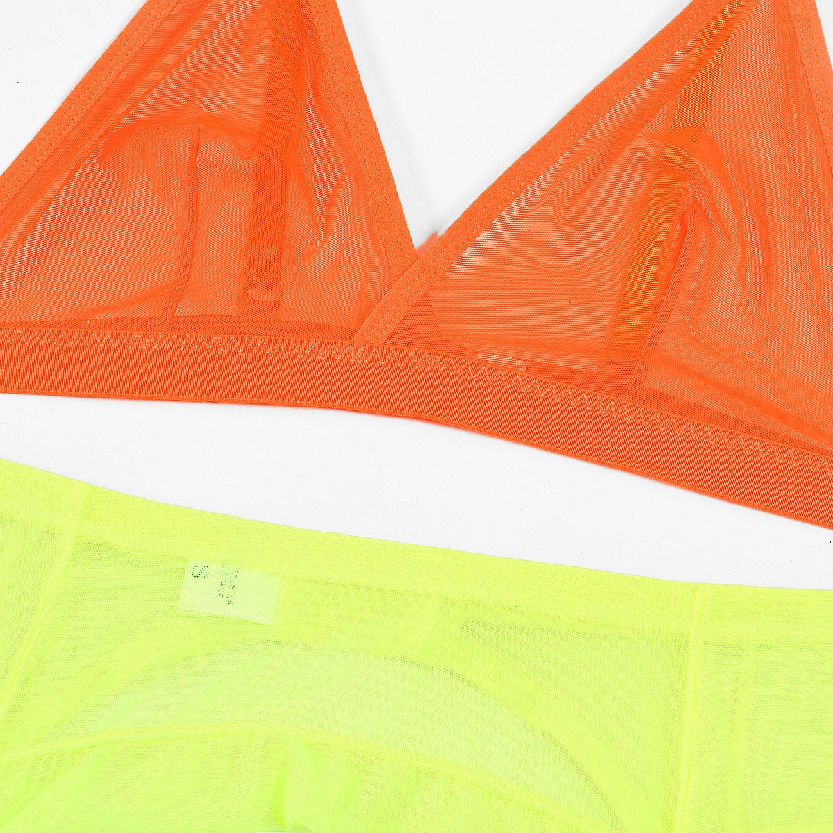 Conjunto de lingerie neon colorido com sutiã e calcinha amarelo laranja e rosa choque