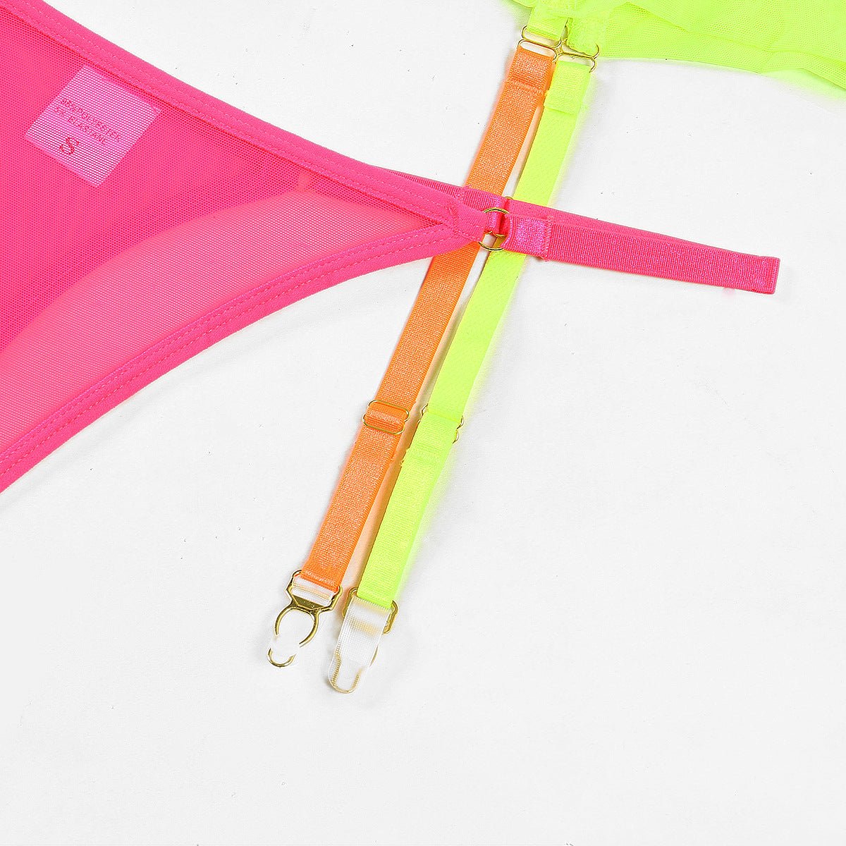 Conjunto de lingerie neon colorido com sutiã e calcinha amarelo laranja e rosa choque