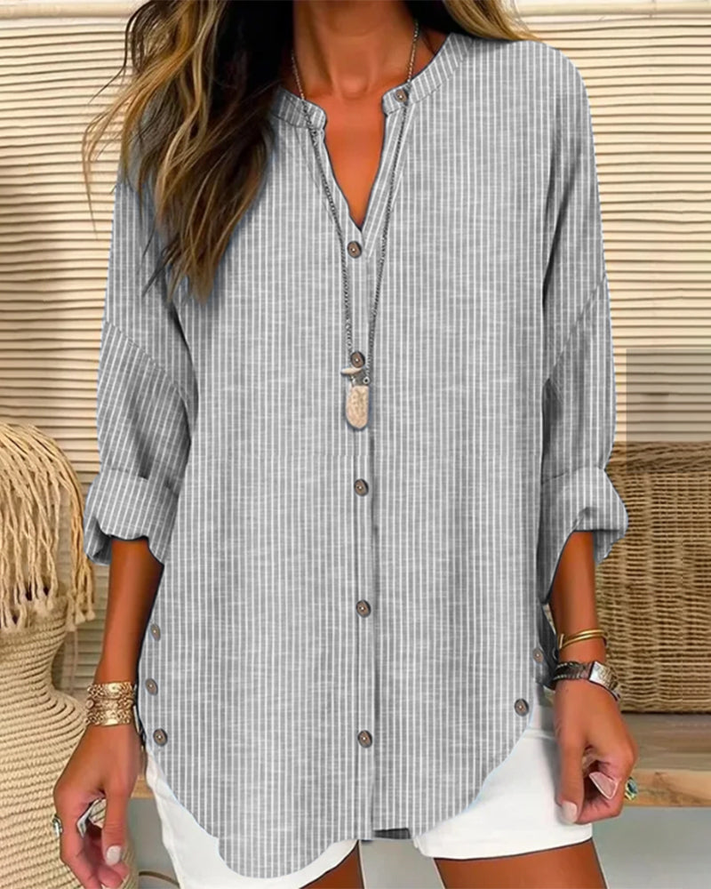 Blusa feminina manga longa listrada decote V com botões corte folgado