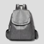 Mochila de couro antifurto feminina com textura em relevo e alças reguláveis
