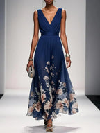 Vestido floral convidada de casamento com decote V e silhueta evasê fluida