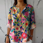 Blusa floral feminina manga 3/4 com botões frontais e corte relaxado