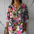 Blusa floral feminina manga 3/4 com botões frontais e corte relaxado