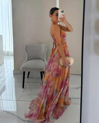 Vestido longo floral feminino com silhueta fluida e fecho ajustável