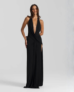Vestido maxi halter costas abertas com fenda lateral e silhueta drapejada