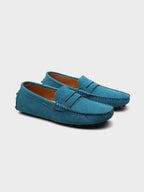 Mocassins camurça slip-on em couro com costuras artesanais