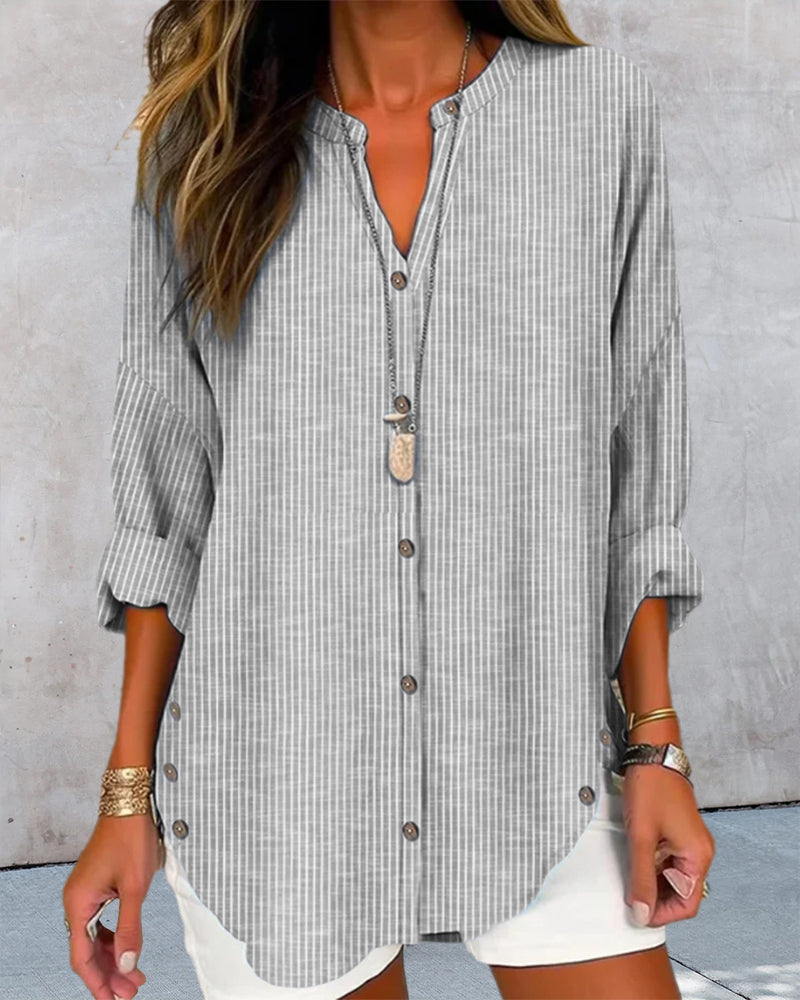 Blusa feminina manga longa listrada decote V com botões corte folgado