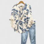 Blusa feminina floral com mangas 3/4 com babados e decote em V
