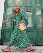 Vestido maxi boho feminino estampado geométrico com decote V e corte fluido