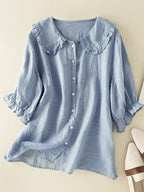 Blusa feminina gola folhada com botões frontais e mangas fluidas
