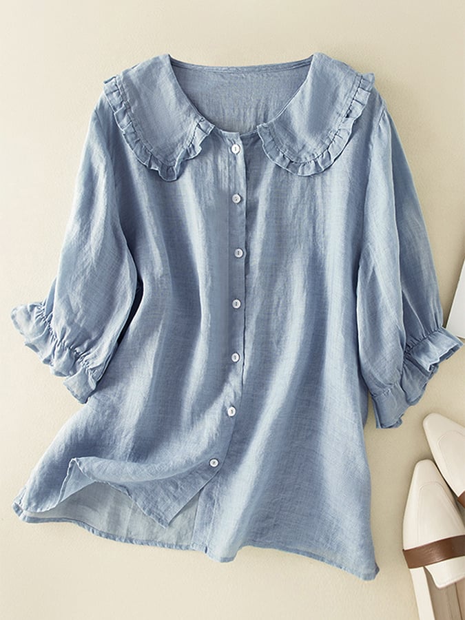 Blusa feminina gola folhada com botões frontais e mangas fluidas