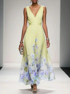 Vestido floral convidada de casamento com decote V e silhueta evasê fluida
