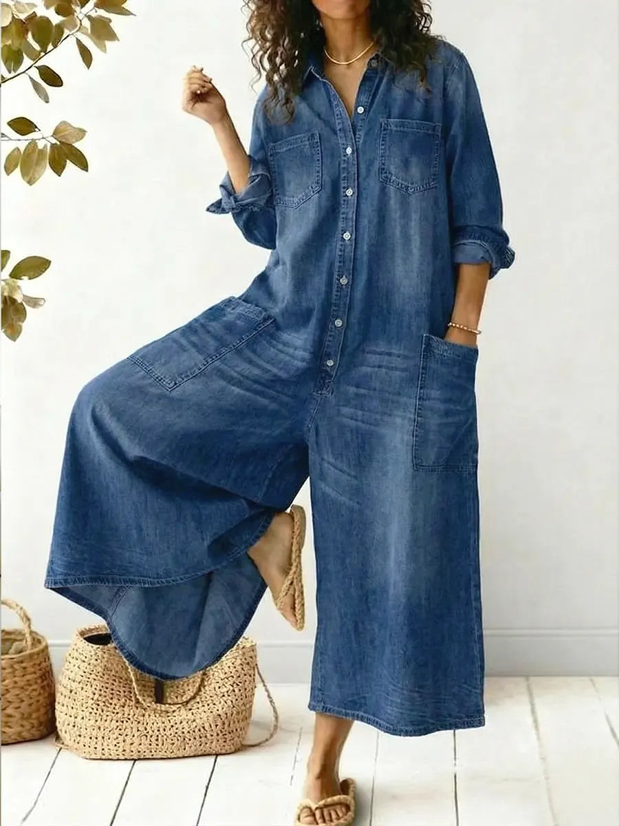 Macacão feminino denim perna larga manga longa com fechamento em botões