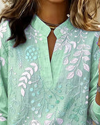 Blusa feminina floral com decote em V, tecido leve e estampa pastel