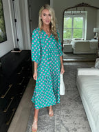 Vestido maxi boho feminino estampado geométrico com decote V e corte fluido