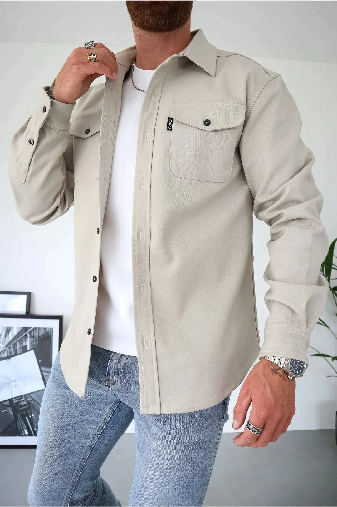 Camisa masculina manga longa com botões e bolsos no peito