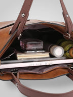 Bolsa tiracolo em couro genuíno com fecho magnético e alça ajustável