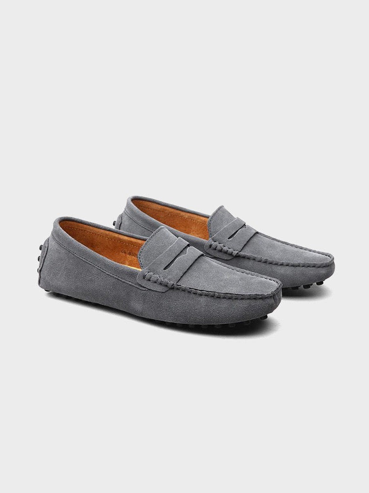 Mocassins camurça slip-on em couro com costuras artesanais