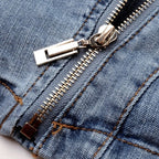 Jaqueta jeans cropped moto feminina com zíper assimétrico e cinto