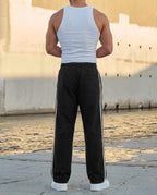 Calças de treino masculinas com riscas laterais e cós elástico ajustável