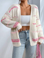 Cardigan de malha oversized feminino às listras com frente aberta