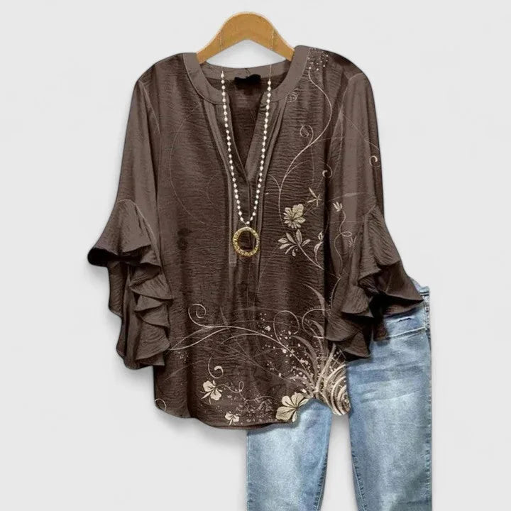 Blusa feminina floral com mangas 3/4 com babados e decote em V