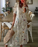 Vestido feminino boho maxi com detalhes de franjas e mangas largas
