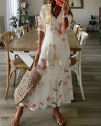 Vestido feminino boho maxi com detalhes de franjas e mangas largas