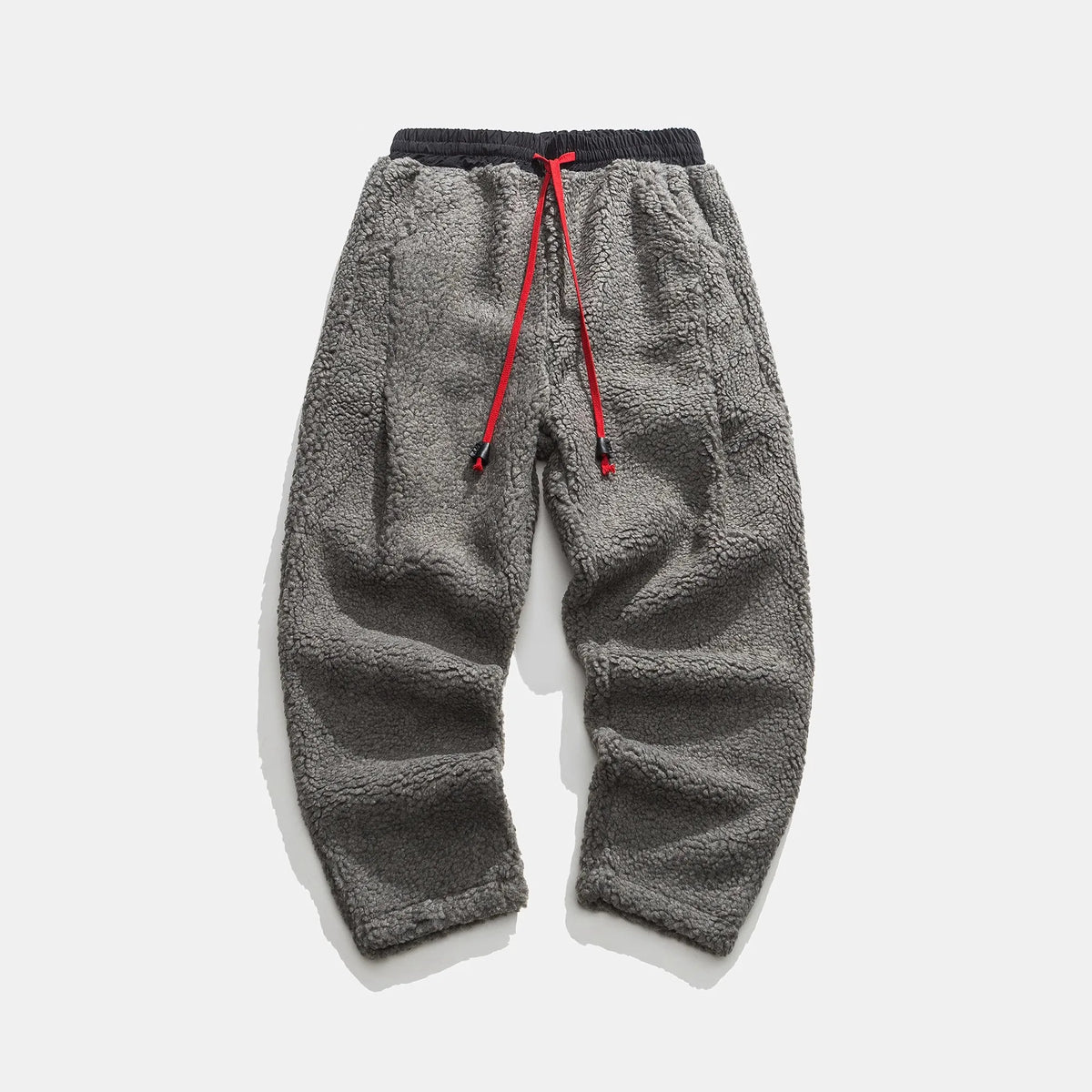 Calças de moletom fleece corte relaxado com cós elástico e cordão