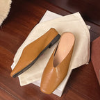 Sapatilhas rasas femininas slip-on em couro vegano liso