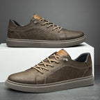 Tênis masculino casual confortável com sola almofadada e design neutro