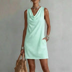 Vestido mini feminino decote drapeado sem mangas silhueta A-line com bolsos laterais