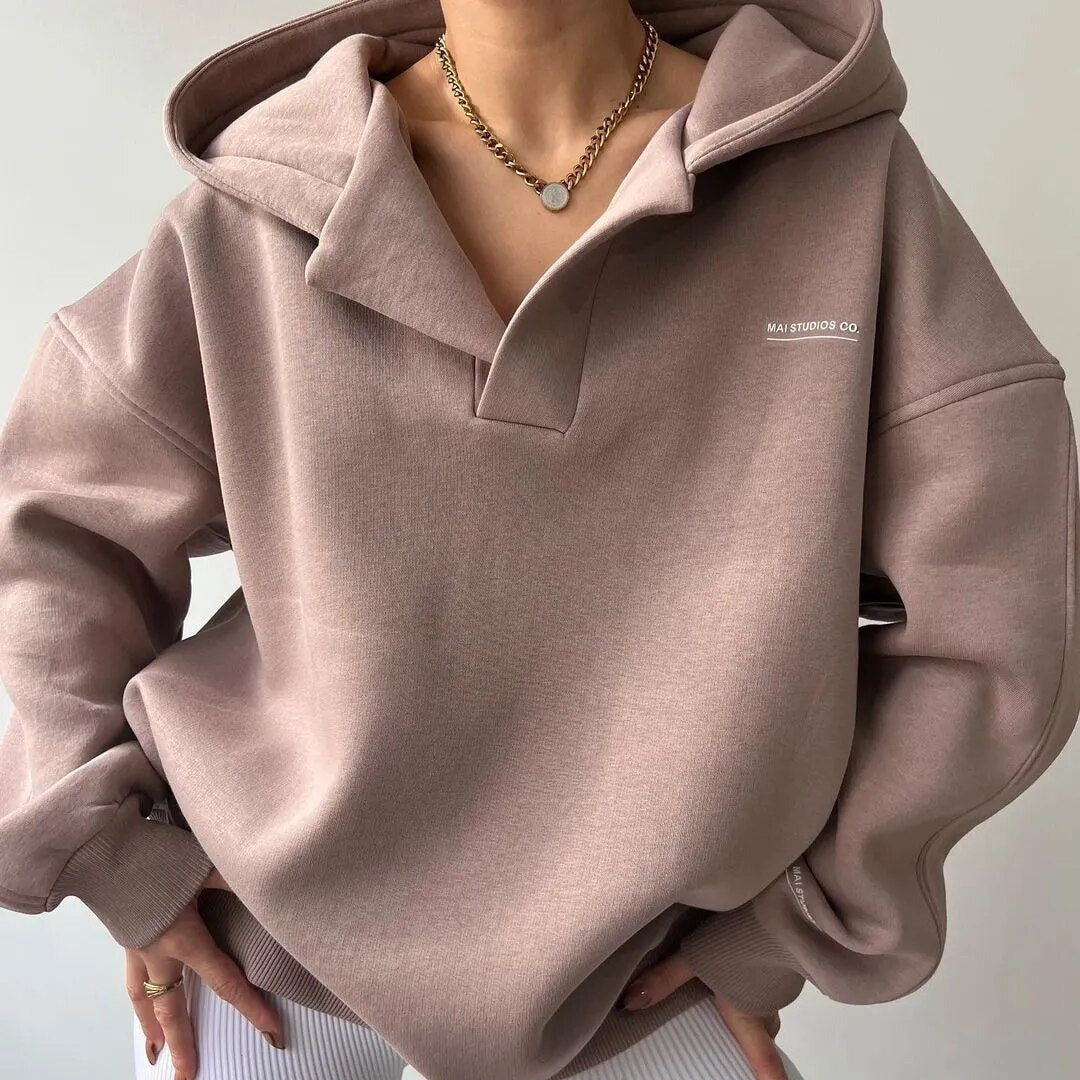 Camisola feminina gola redonda moderna em rosa bege e cinzento