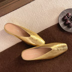 Sapatilhas rasas femininas slip-on em couro vegano liso