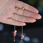 Brincos natalinos pendentes com motivo Papai Noel e sinos, metal antioxidante 7,5 cm