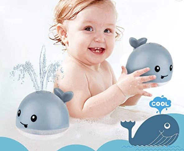 Brinquedo de banho baleia com jato de água automático e luzes LED coloridas para bebés