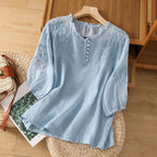 Blusa feminina bordada corte relaxado manga curta decote redondo