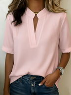 Blusa feminina gola V relaxed fit manga curta com punho