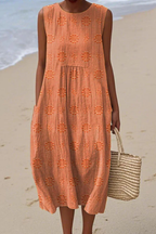 Vestido midi feminino sem mangas com bordado floral tonal e silhueta folgada