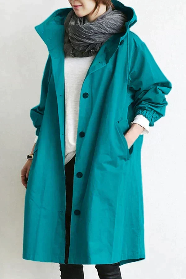 Impermeável feminino com capuz oversize respirável corte urbano