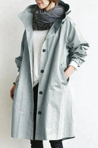 Impermeável feminino com capuz oversize respirável corte urbano