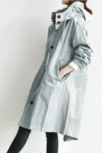 Impermeável feminino com capuz oversize respirável corte urbano