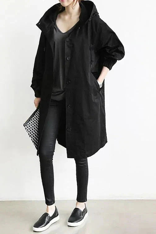 Impermeável feminino com capuz oversize respirável corte urbano