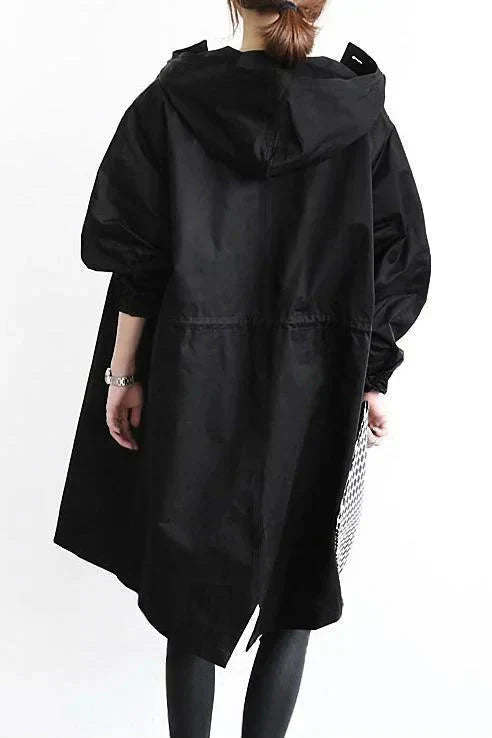 Impermeável feminino com capuz oversize respirável corte urbano